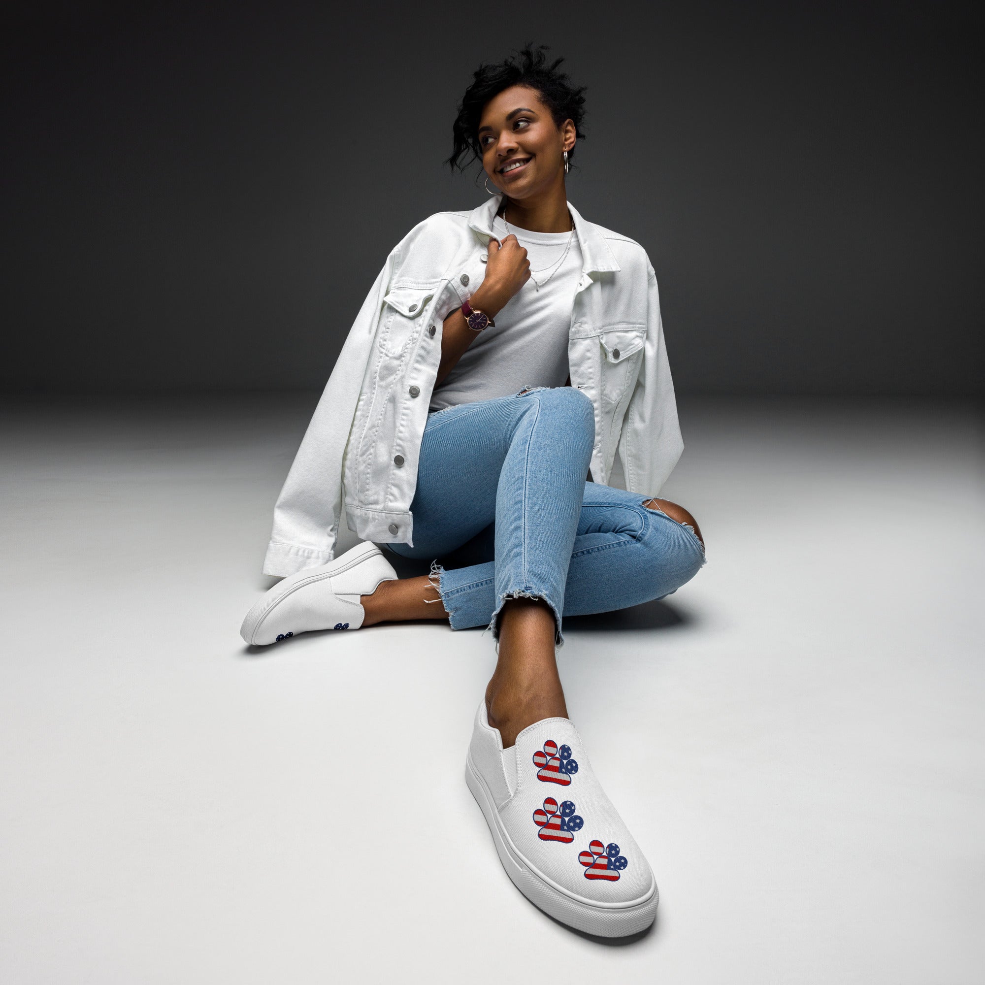 Women’s White slip-on Paw Print Shoes
