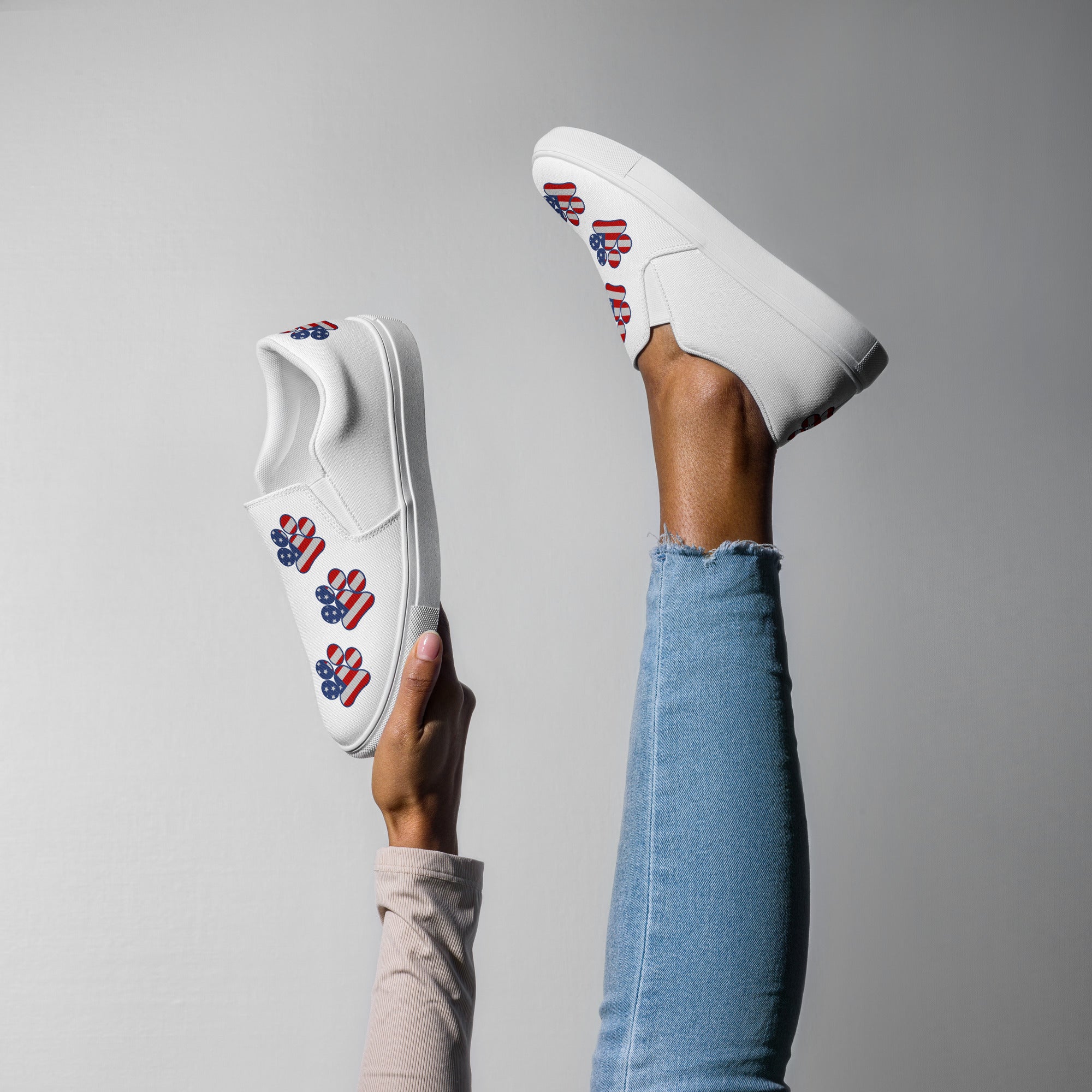 Women’s White slip-on Paw Print Shoes